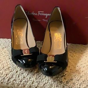 Ferragamo black patent pumps
